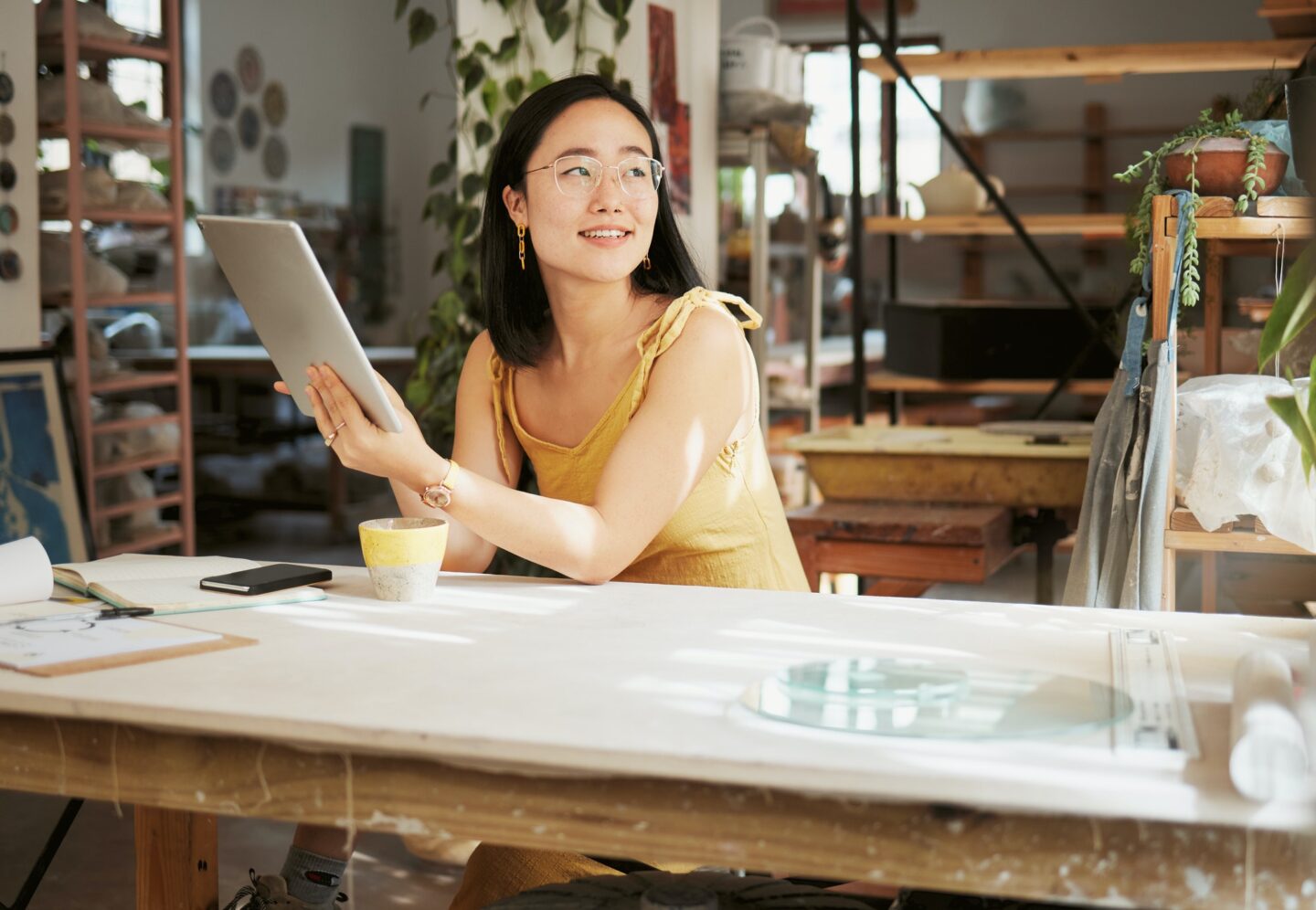 Thinking, relax and tablet with of asian woman and idea in startup for management, planning and res