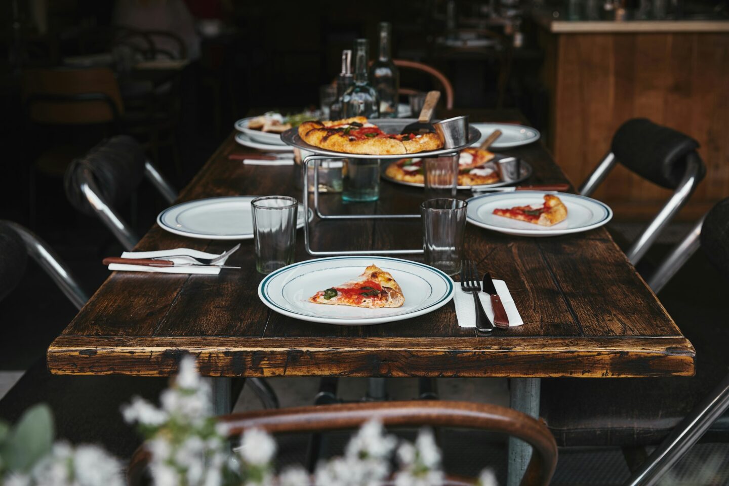 delicious pizza on table at modern restaurant