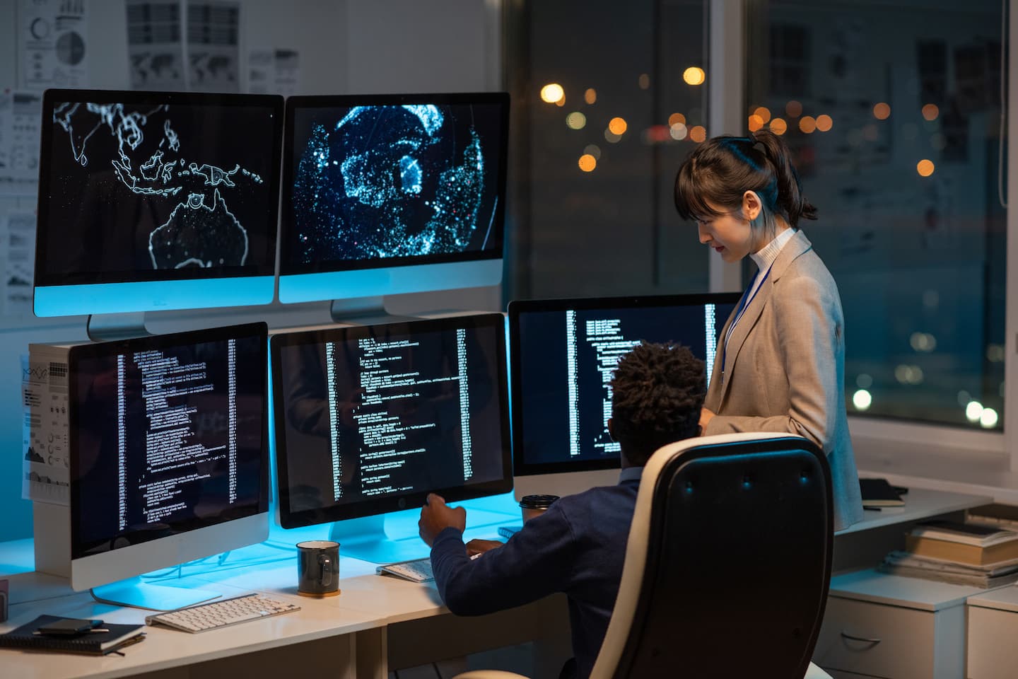 two-intercultural-programmers-decoding-data-on-com-YHTVCBP